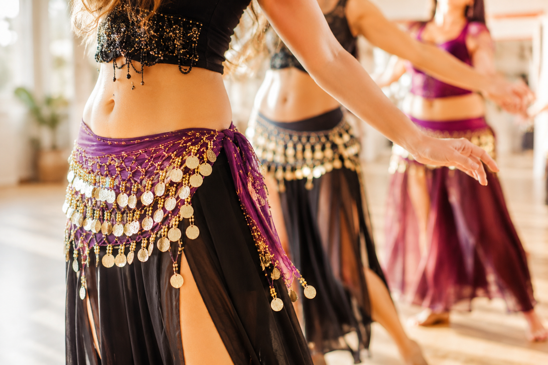 Women Belly Dancing in Studio 