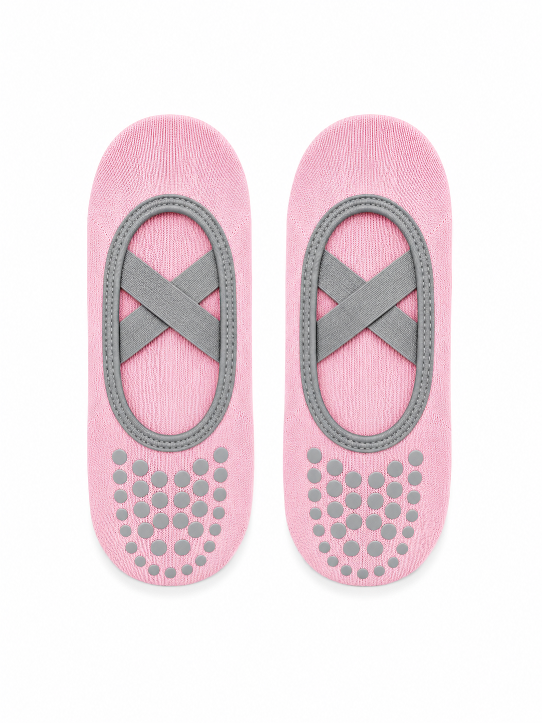 Pair of pink socks with gray grip patterns on a white background