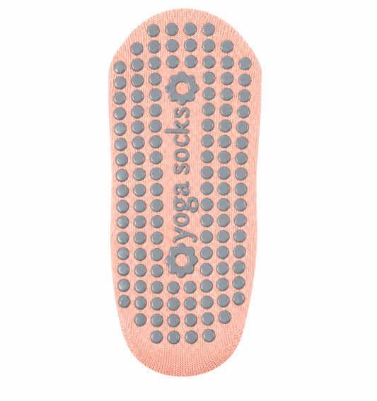 Yoga socks insole with gray textured dots on a white background