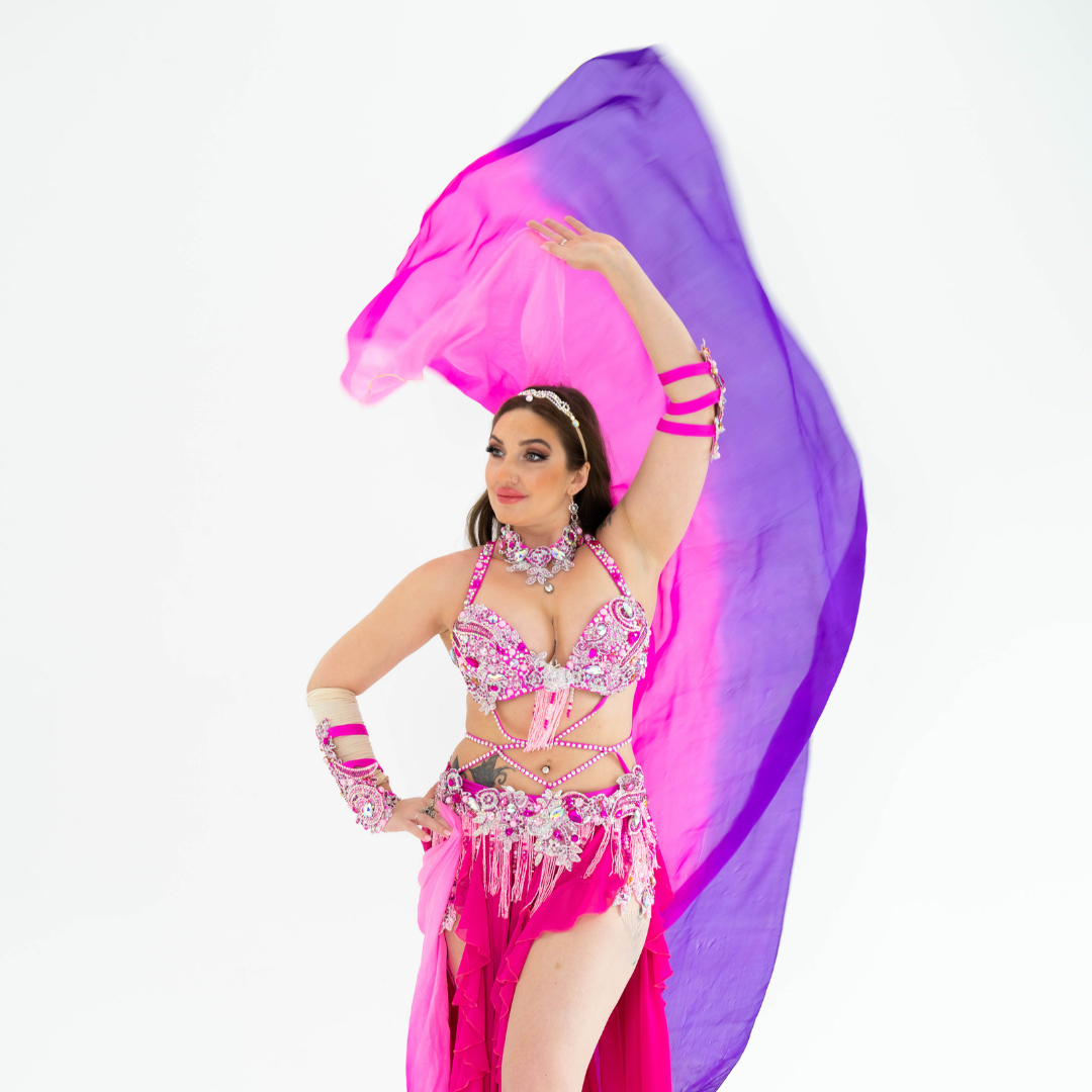 Belly dancer with veil dancing in London venues